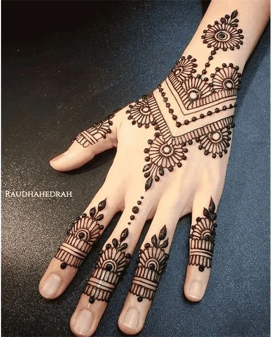 Vibrant Wave Trail On Back Hand Mehndi Design